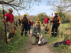Supporting image for story: Wildlife team and firefighters to the rescue of stranded 'beaten-up' swan
