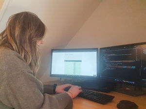 Digital developer Nikki Baird-Murray working on Powys County Council’s Supply Chain Sustainability Portal