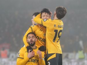 Hwang Hee-Chan (centre) celebrates scoring against Manchester United