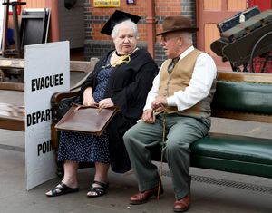 This couple looked dashing as they saw and waited for their train