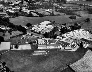 Picture two – in the 1960s the town had separate secondary schools for boys and girls, on opposite sides of the road. But which is which?