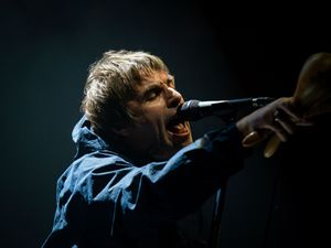 Supporting image for story: Liam Gallagher performs Live Forever in memory of Foo Fighters drummer