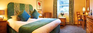Relax in one of the comfy bedrooms of The Black Swan Hotel, in Helmsley