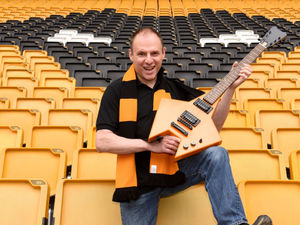 Supporting image for story: Wolves fan builds guitar in shape of club logo