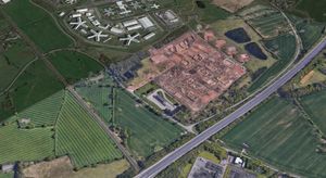An aerial view of the land next to the M54, Featherstone Prison and the west coast mainline. Photo: Google