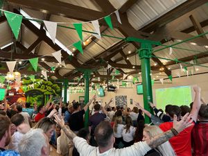 The pub erupts into celebrations after England's win against Switzerland. Photo: Green Duck