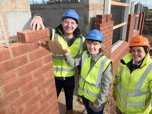 Supporting image for story: First time buyers given honour of laying brick in their new home