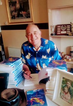 Geoff with his books