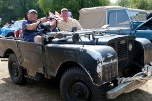 Tim Hall and his friend Kevin Lowe sitting in Tim’s 1950 Landrover 80 series. Tim bought the vehicle in 2023 and has rebuilt the engine. He also had two other Landrovers on display including one which was electric. Image by Andy Compton