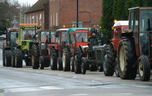Tractors wind their way through the streets of Pattingham at the end of the Shropshire tractor run from Bridgnorth to Pattingham