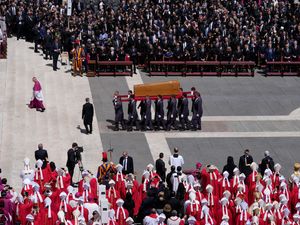 The coffin of Pope Francis is carried at the end of his funeral