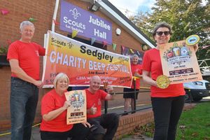 Annette Mitchell, front, with Ian Foster, Debra Baugh, David Baugh and David Mitchell, preparing for the 11th Sedgley beer festival