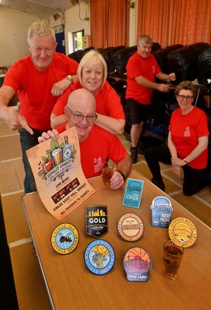 Sedgley Scouts' Jubilee Hall is being taken over for the 11th Sedgley Charity Beer, Cider and Gin Festival on Friday and Saturday. Front kneeling is: David Baugh with Ian Foster and Debra Baugh, and at the back: David Mitchell and Annette Mitchell.