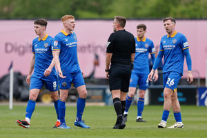 Shrewsbury Town players react after conceding a goal to make it 0-2 (AMA)