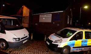 The scene at Hawes Lane, Rowley Regis, tonight where a murder investigation has been launched.