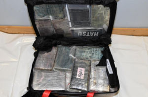 The suitcases were picked up from the baggage carousel after being loaded onto the plan in Cancun in Mexico. Photo: National Crime Agency