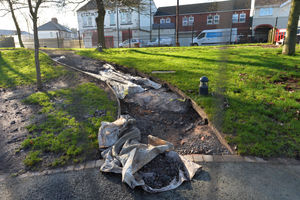 A damaged footpath at the school