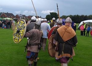 The actors prepare to stage the battle