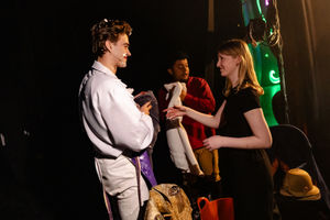 Beth Wesley makes sure Solomon Davy is ready to go on stage. Photo: Danny Kaan