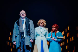 Mr Warbucks played by Mike Jenkinson-Deakin pictured with Grace Farrell (Adele Clarkson) and Annie (Izzy Ellis)