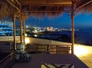 Let it lie – enjoy a relaxing drink on a canopy bed