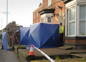 The gflats remained cordoned off on Sunday as the terrorism investigation continued