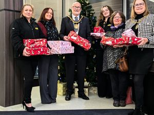 Supporting image for story: Finning team surpass Christmas gift target for local charity