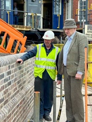 Malvern Tipping with Cliff Railway engineer Barry Evans inspecting the retaining wall 