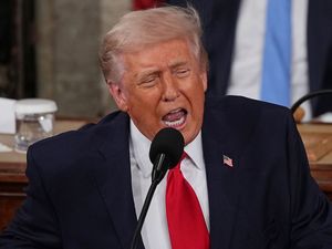 Supporting image for story: Donald Trump says countries are ‘happy’ with tariffs as he vows to keep them