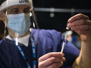 Supporting image for story: Social restrictions ‘may have to continue until half the population vaccinated’