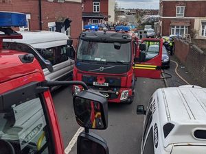 Supporting image for story: Woman led to safety after fire in basement of Dudley property